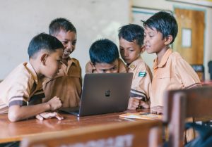 Photo by Agung Pandit Wiguna: https://www.pexels.com/photo/boy-using-silver-macbook-indoors-3401403/